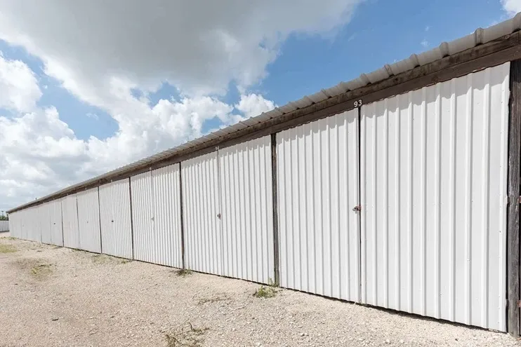row of self storage units with drive up